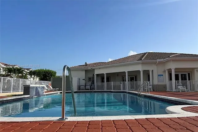 a view of a house with a swimming pool