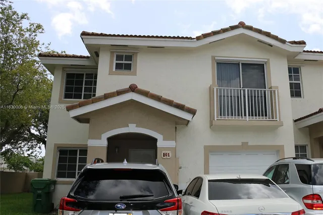 a car parked in front of a house