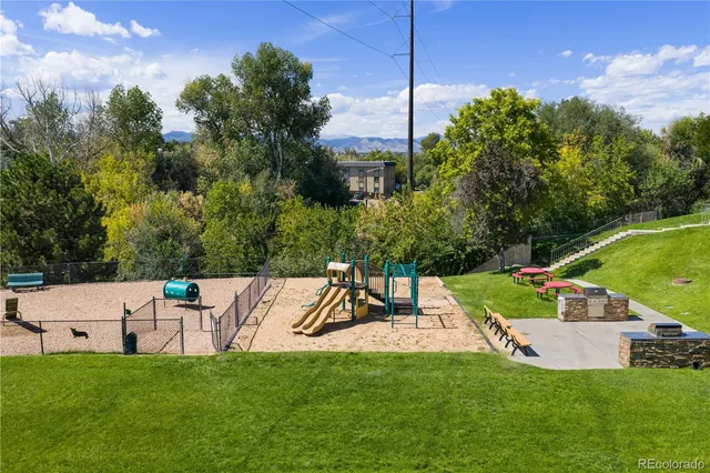 a view of a backyard with a slide
