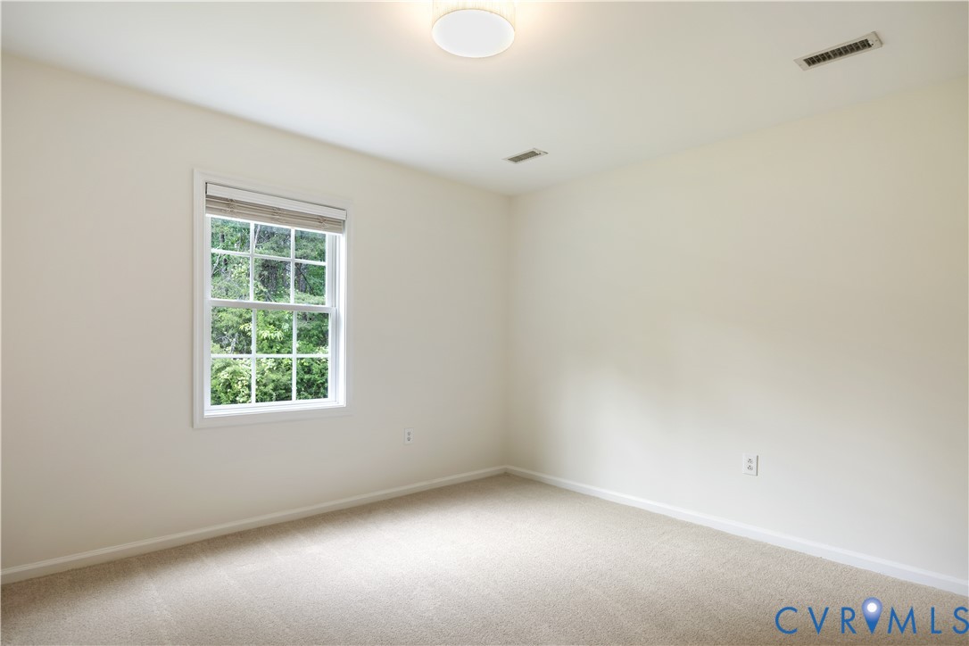 5 Walters Way Bumpass, VA 23024 - Photo 18 of 28 an empty room with a window