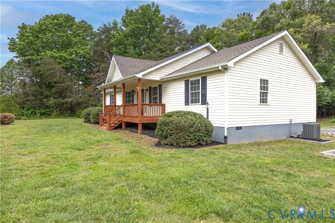 5 Walters Way Bumpass, VA 23024 - Photo 2 of 28 a view of a house with a yard and sitting area