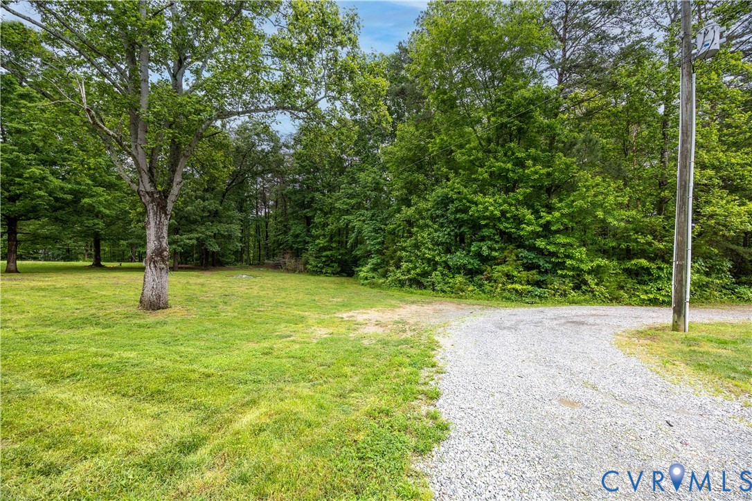 5 Walters Way Bumpass, VA 23024 - Photo 25 of 28 a view of a yard with a tree