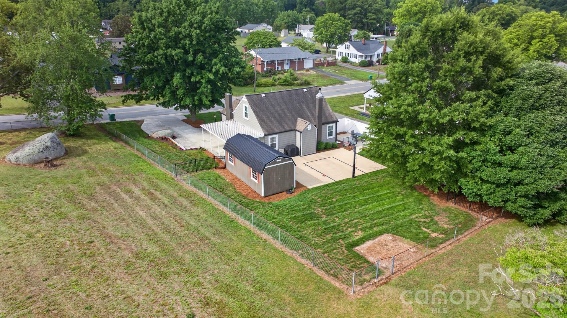 1016 Raney Street Salisbury, NC 28146 - Photo 34 of 45 an aerial view of a house with garden space and street view