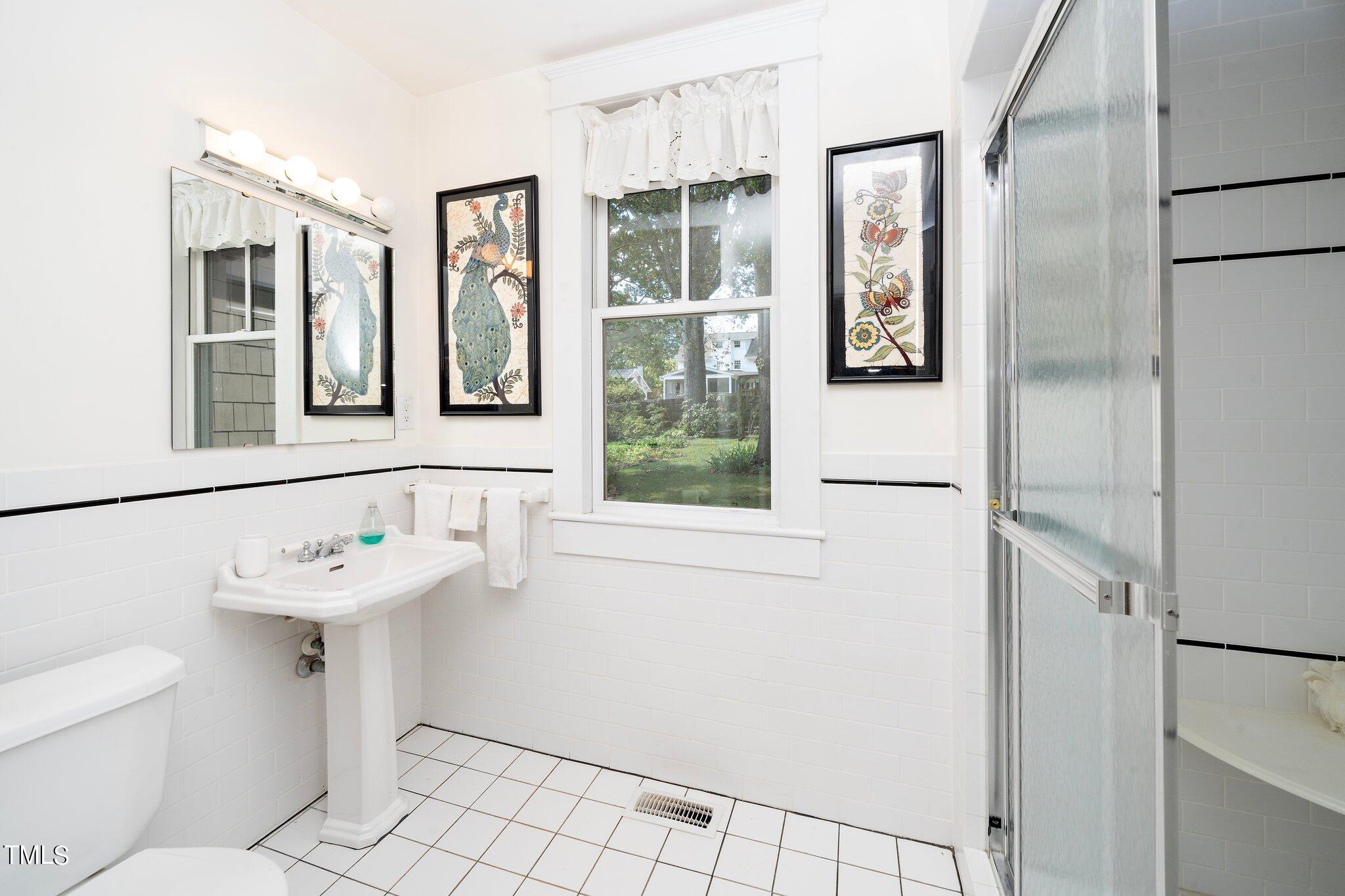 2121 Cowper Drive Raleigh, NC 27608 - Photo 22 of 38 First Floor Full Bathroom