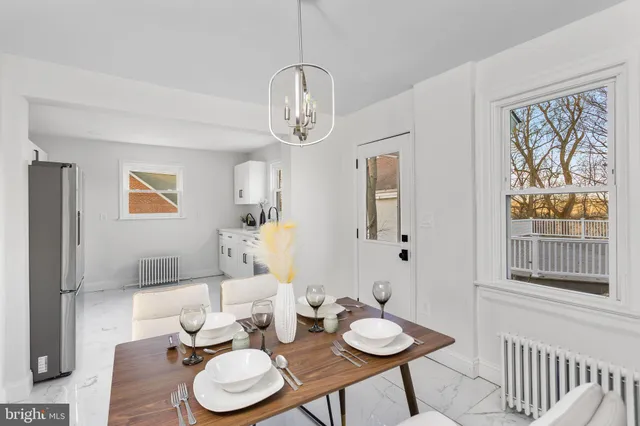 a room with a bed and a window