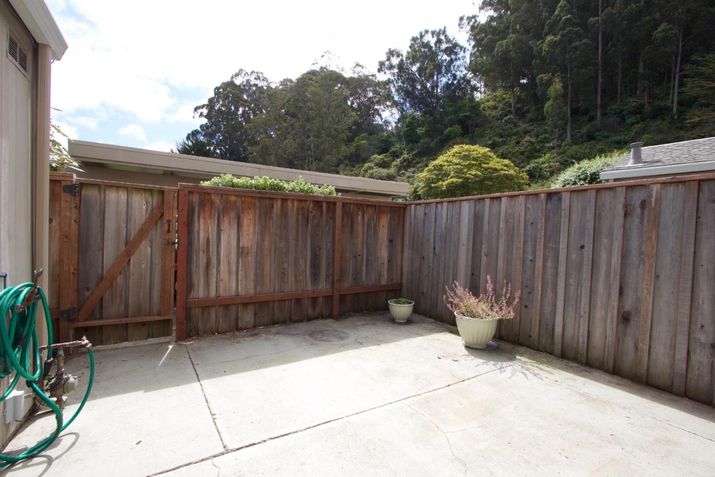 1265 Rosita Road Pacifica, CA 94044 - Photo 11 of 15 a view of outdoor space with wooden fence