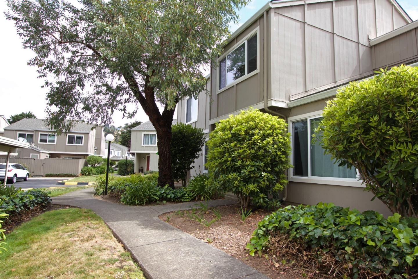 1265 Rosita Road Pacifica, CA 94044 - Photo 2 of 15 a front view of a house with garden
