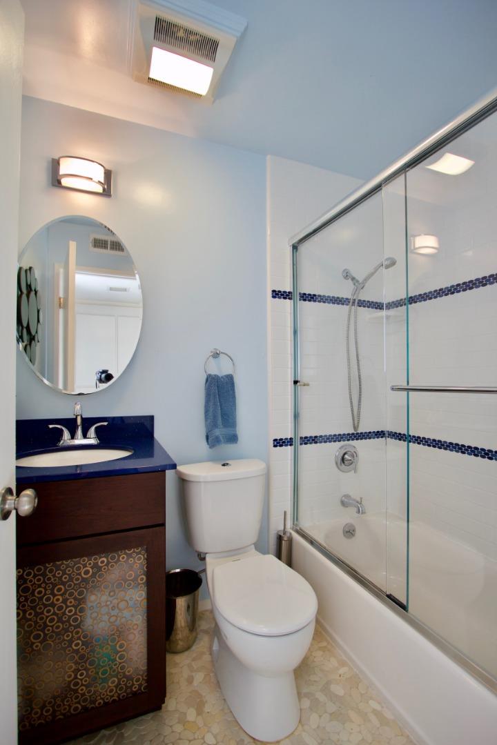 1265 Rosita Road Pacifica, CA 94044 - Photo 9 of 15 a bathroom with a sink toilet a mirror and shower