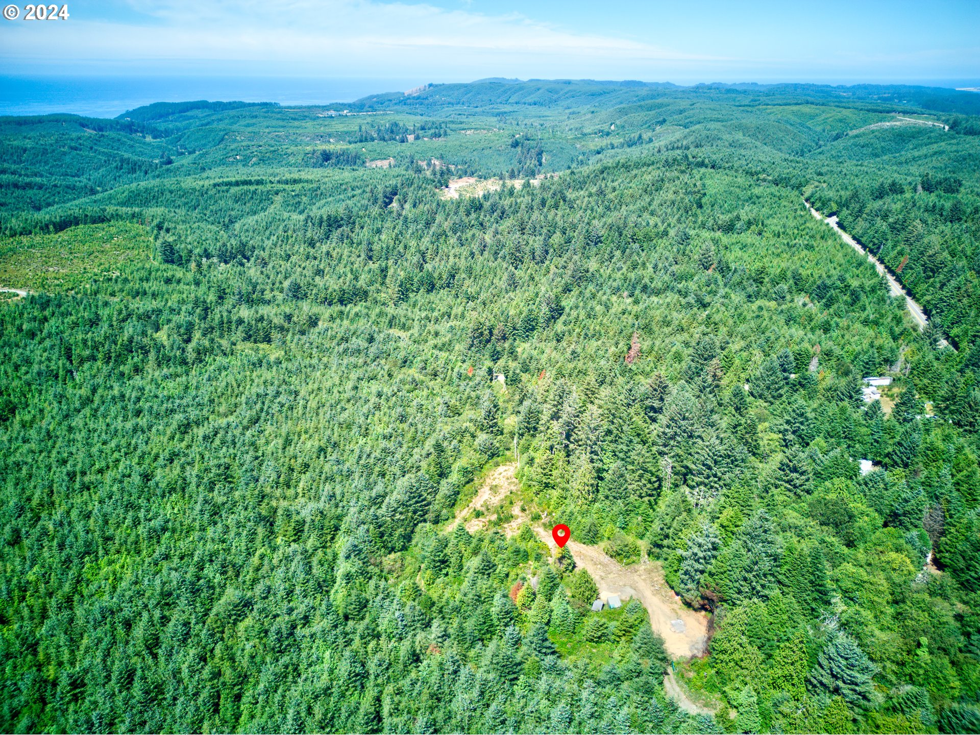 59430 West Beaver Hill Road Bandon, OR 97411 - Photo 13 of 14 a view of a lush green space with sea