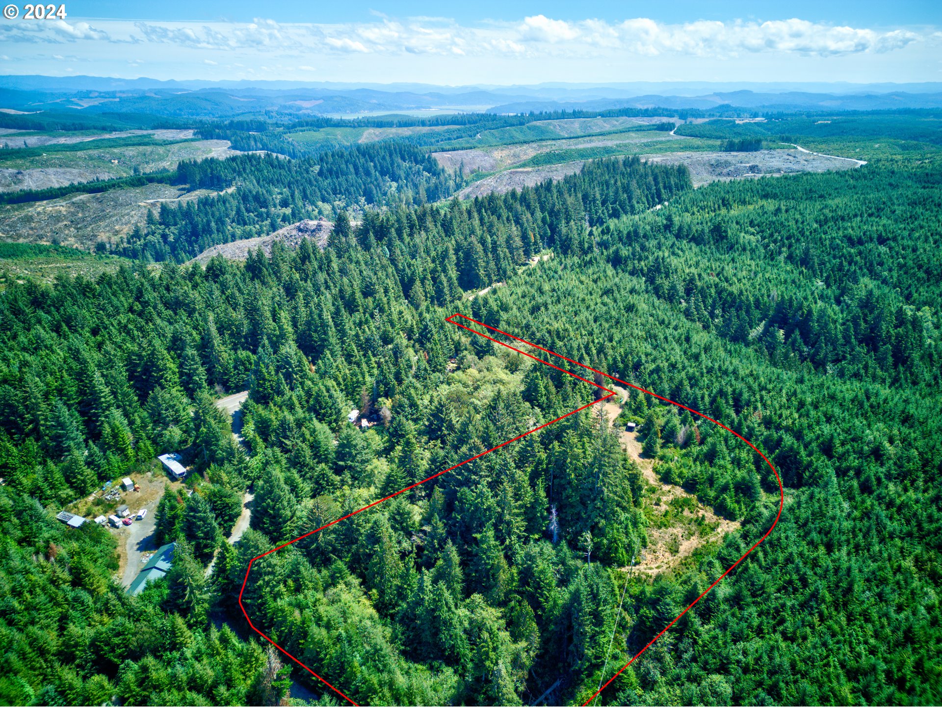 59430 West Beaver Hill Road Bandon, OR 97411 - Photo 9 of 14 a view of a lush green space with sea