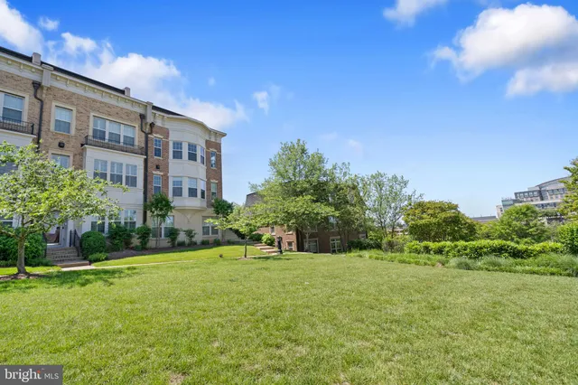 a view of a building with a yard