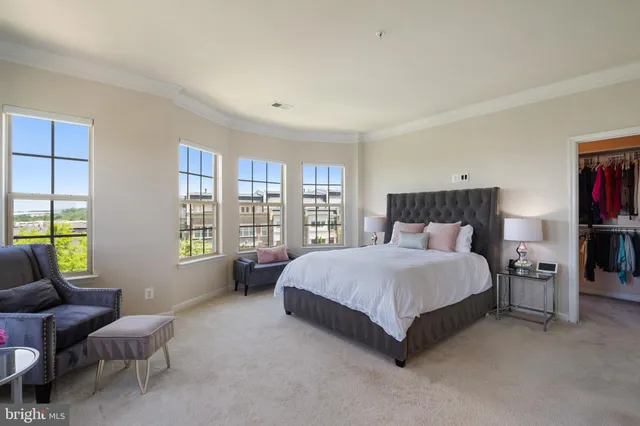 a bedroom with a bed and furniture