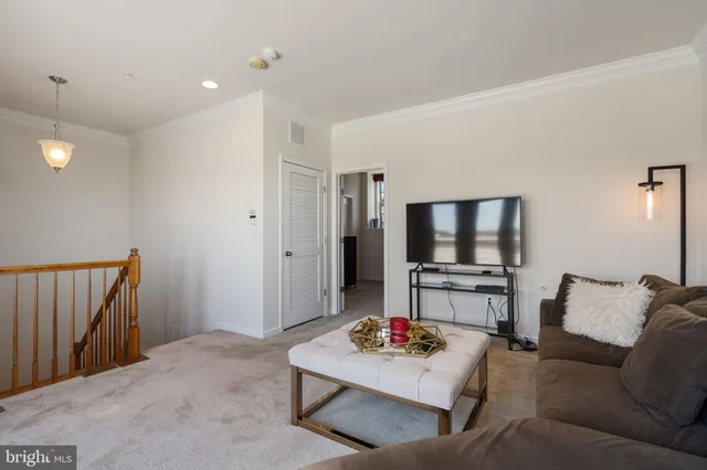 a bedroom with bed and window