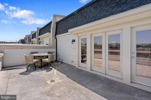 a view of a building with a yard