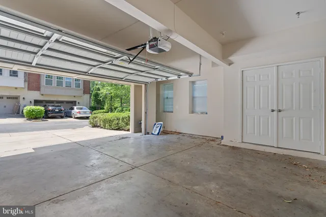 a front view of a building with garden