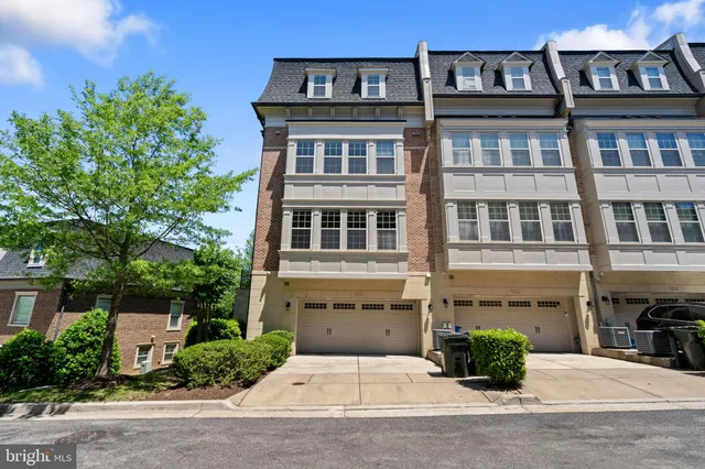 a city street lined with tall buildings