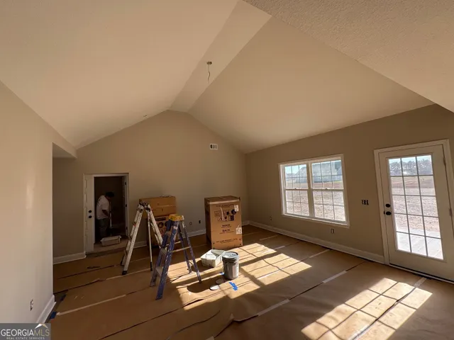 a view of livingroom with furniture and windows