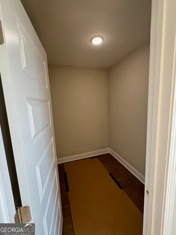 a view of storage and utility room with a sink