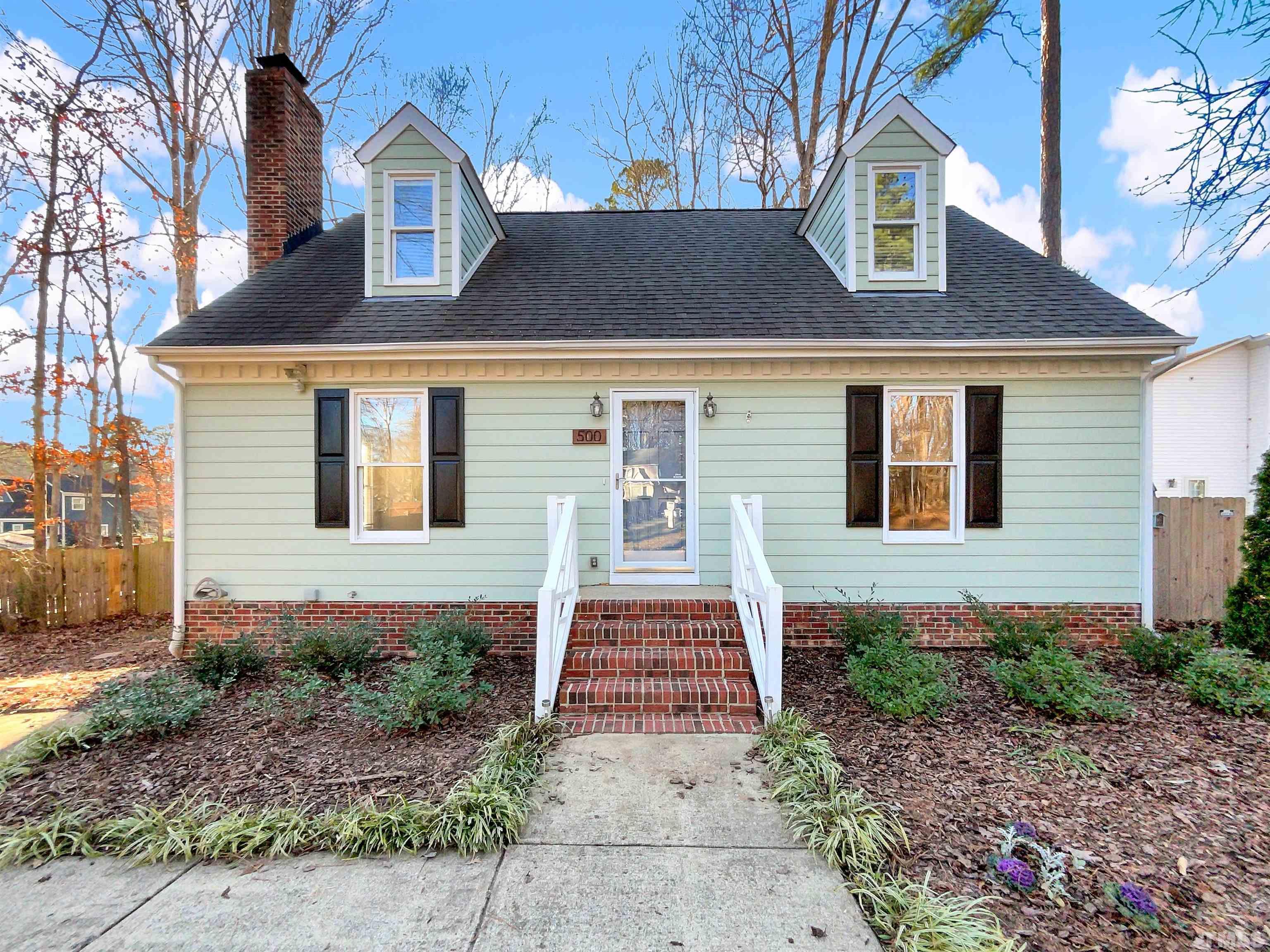 a front view of house with yard
