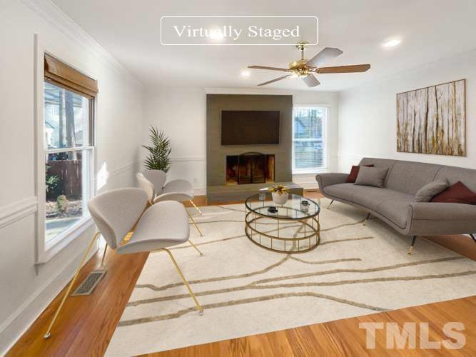 500 Chapwith Road Garner, NC 27529 - Photo 17 of 17 a living room with furniture and a fireplace