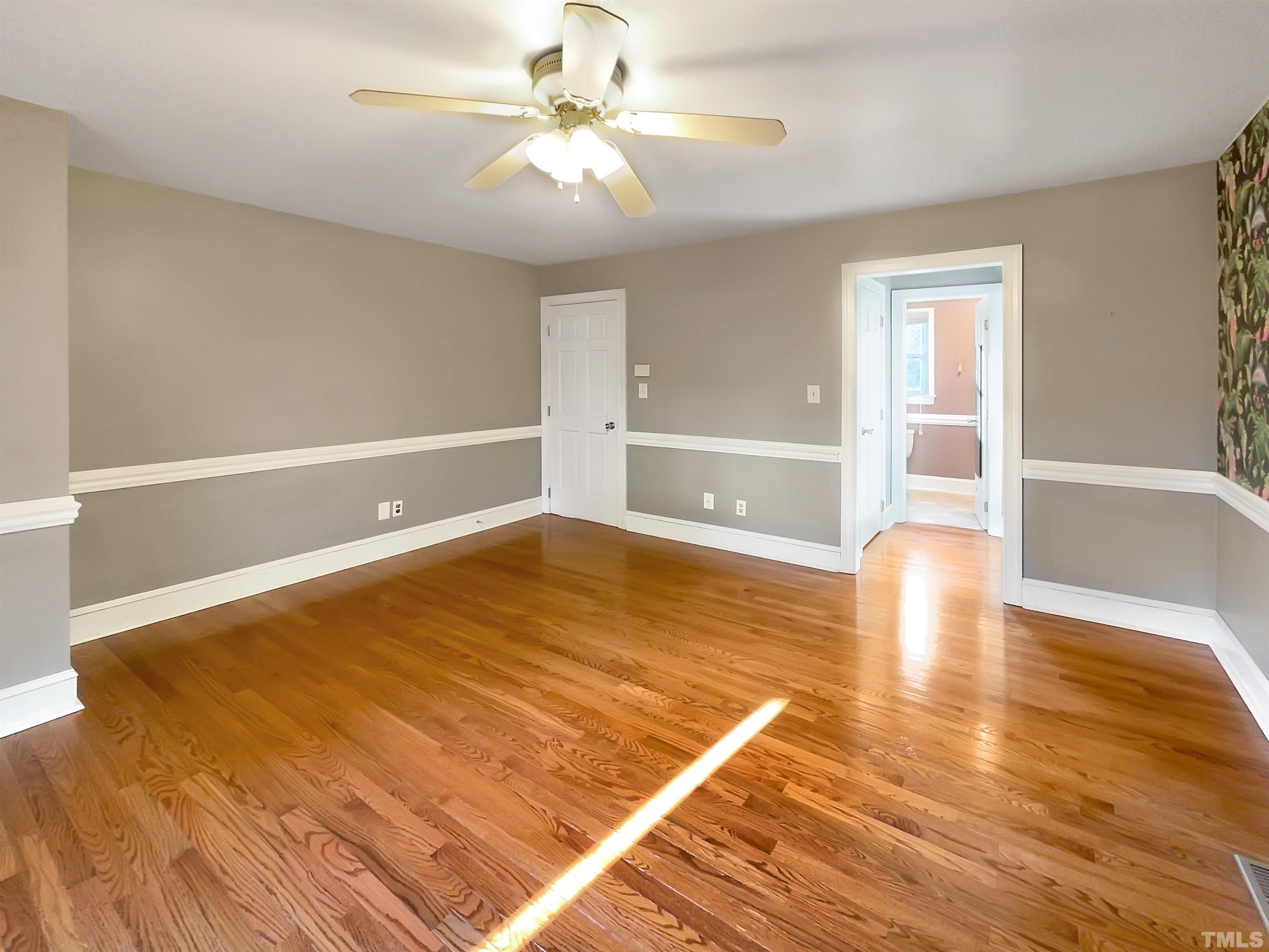 500 Chapwith Road Garner, NC 27529 - Photo 7 of 17 a view of empty room with wooden floor