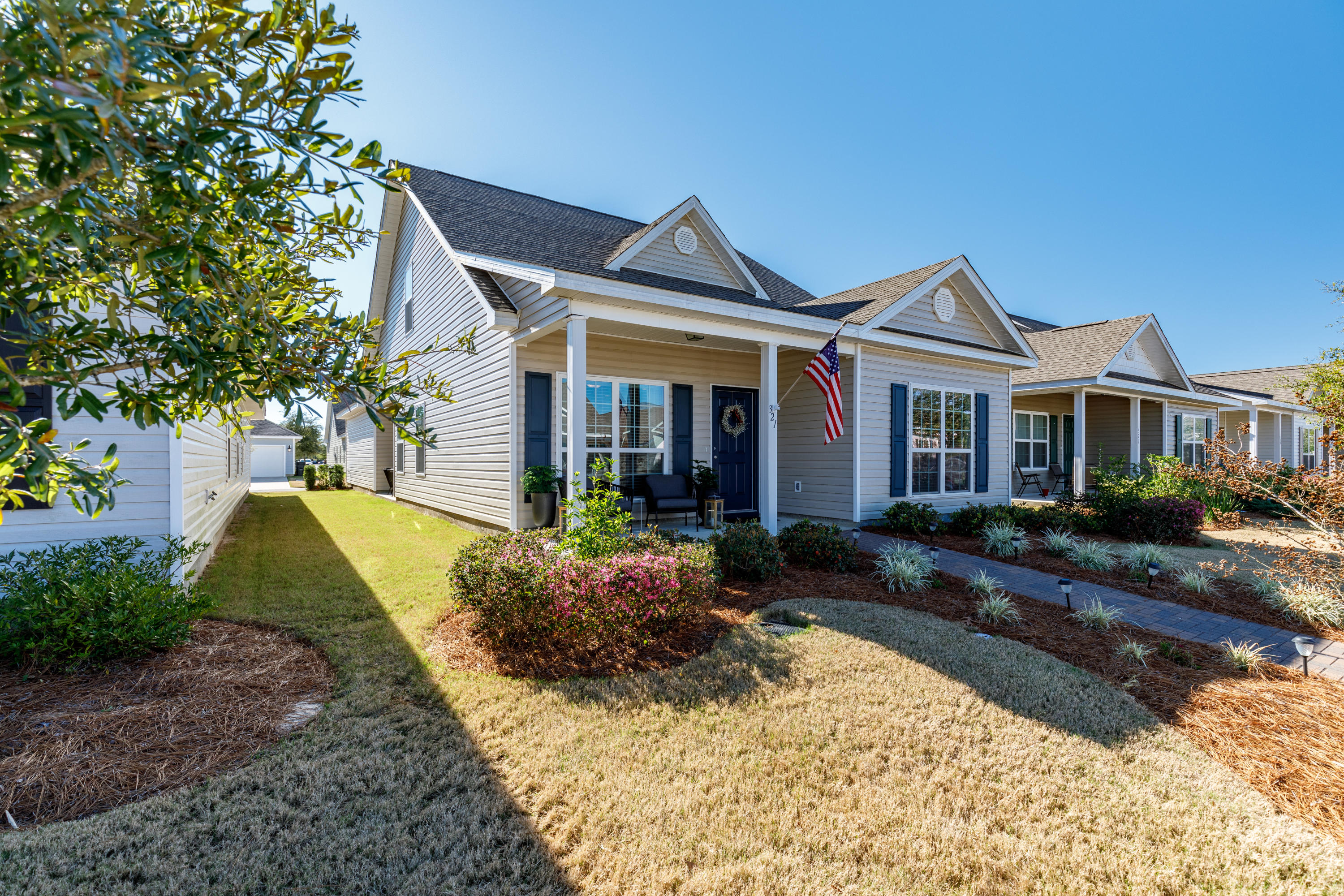 321 Fanny Ann Way Freeport, FL 32439 - Photo 2 of 38 a view of a yard in front of house