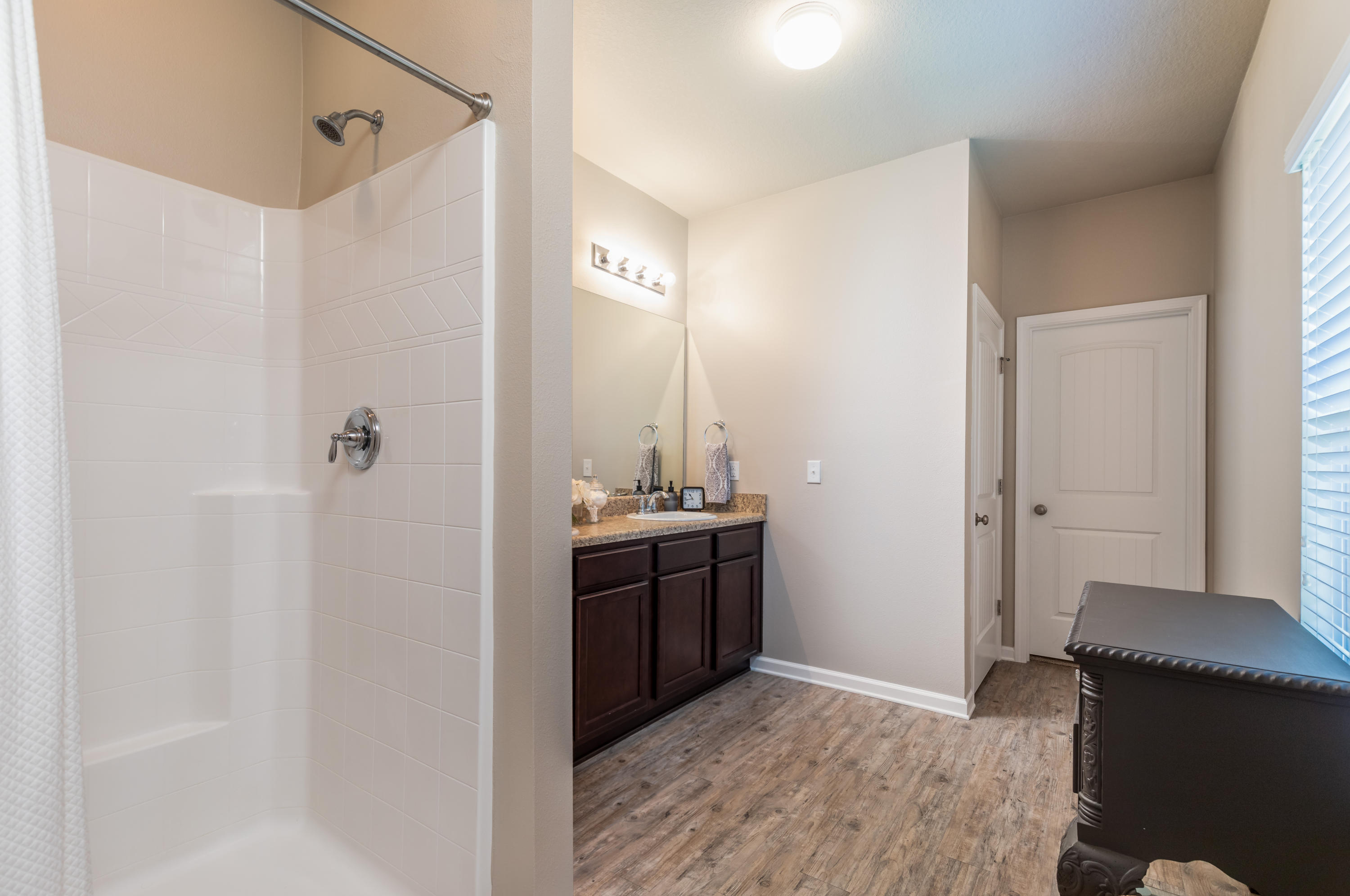 321 Fanny Ann Way Freeport, FL 32439 - Photo 11 of 38 a view of a bathroom from a hallway