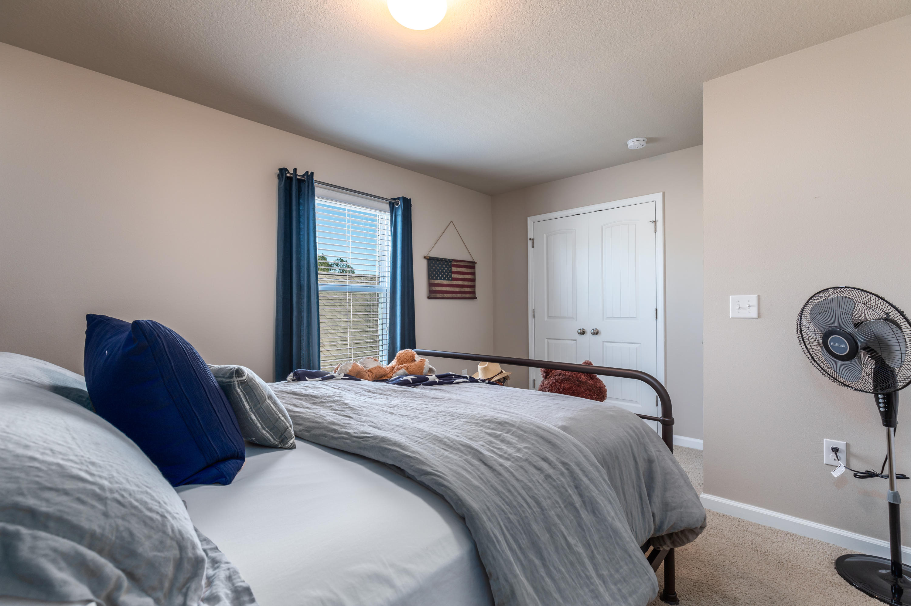 321 Fanny Ann Way Freeport, FL 32439 - Photo 16 of 38 a bedroom with a bed and window