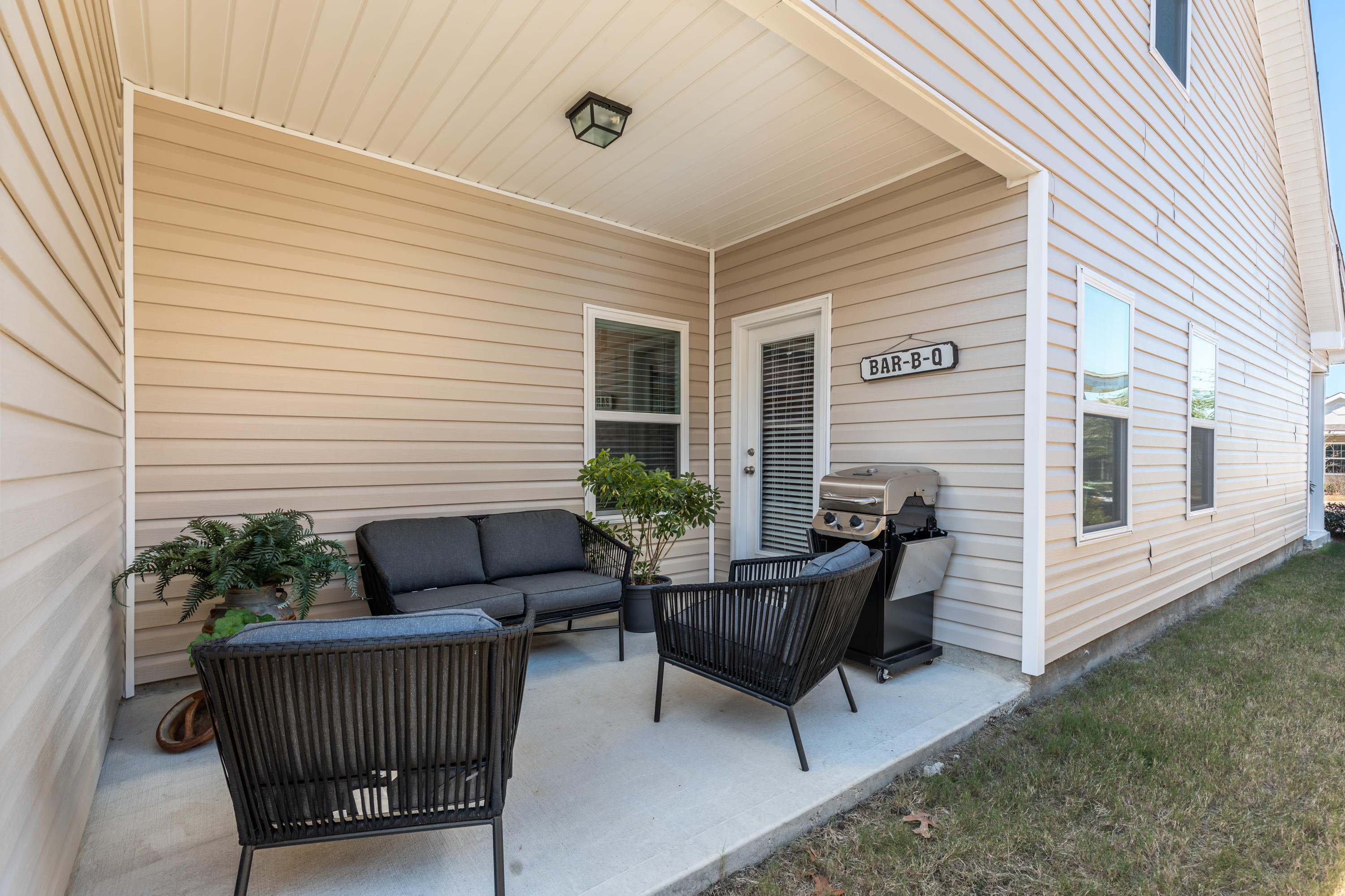 321 Fanny Ann Way Freeport, FL 32439 - Photo 21 of 38 a view of house with patio and outdoor seating