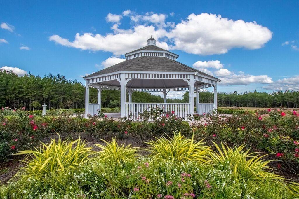 321 Fanny Ann Way Freeport, FL 32439 - Photo 27 of 38 a view of a house with a big yard and potted plants