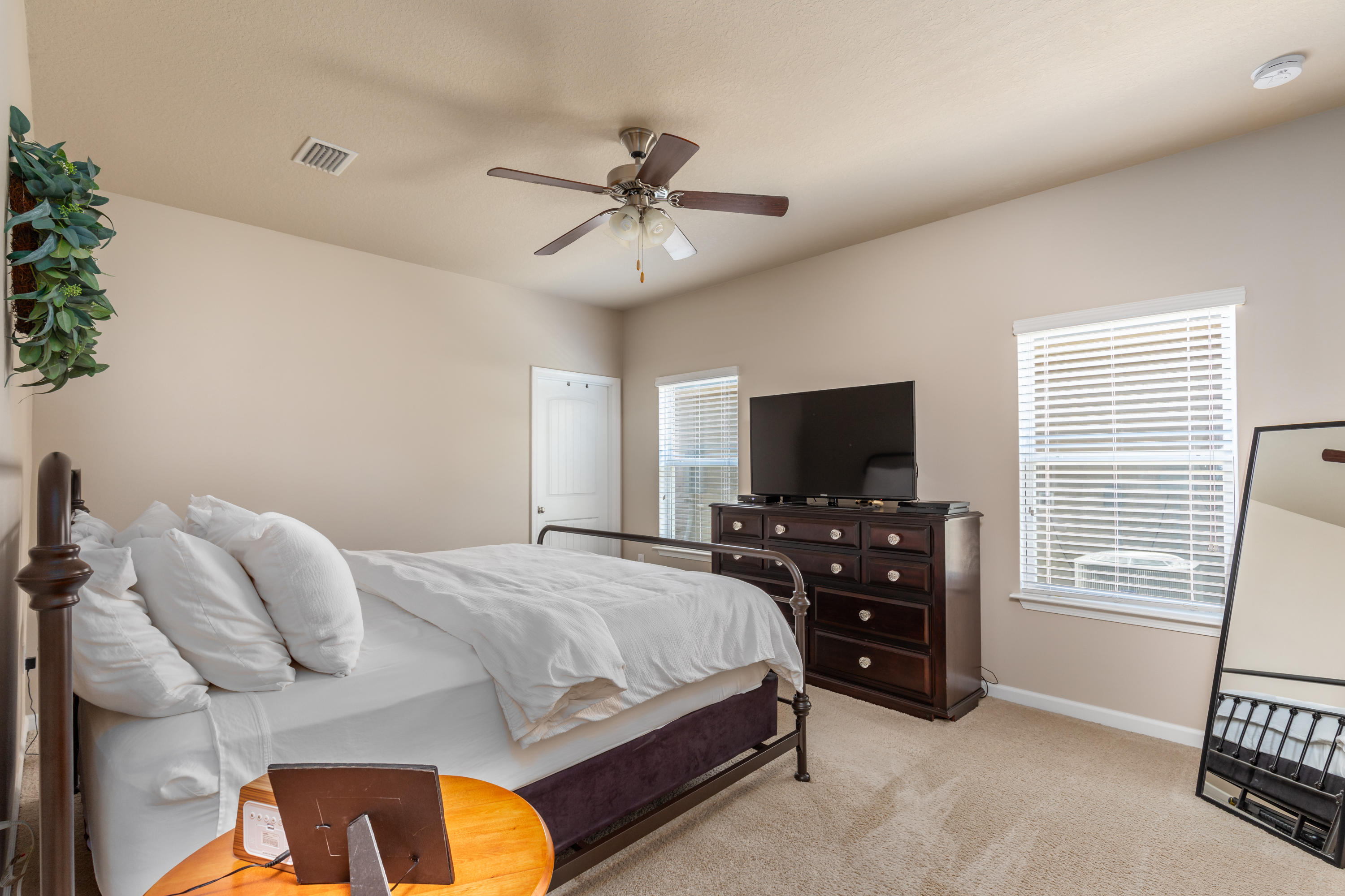 321 Fanny Ann Way Freeport, FL 32439 - Photo 10 of 38 a bedroom with a bed and a flat screen tv