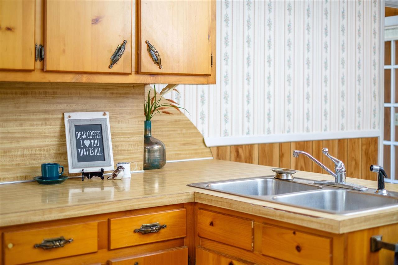 4159 Cold Springs Road Raphine, VA 24472 - Photo 8 of 39 a kitchen with a sink and a window