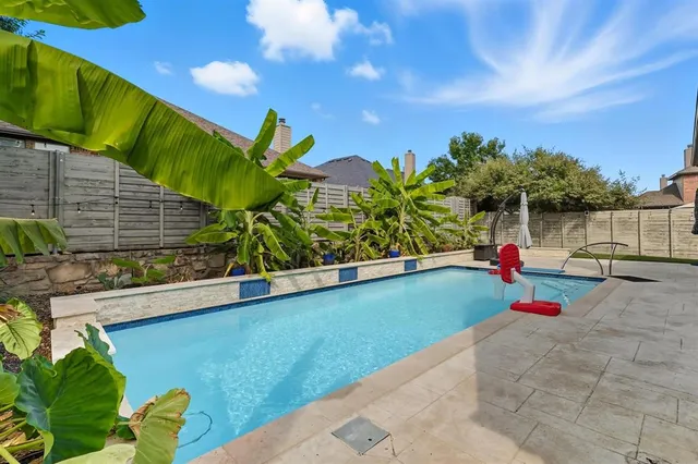 a backyard of a house with a yard