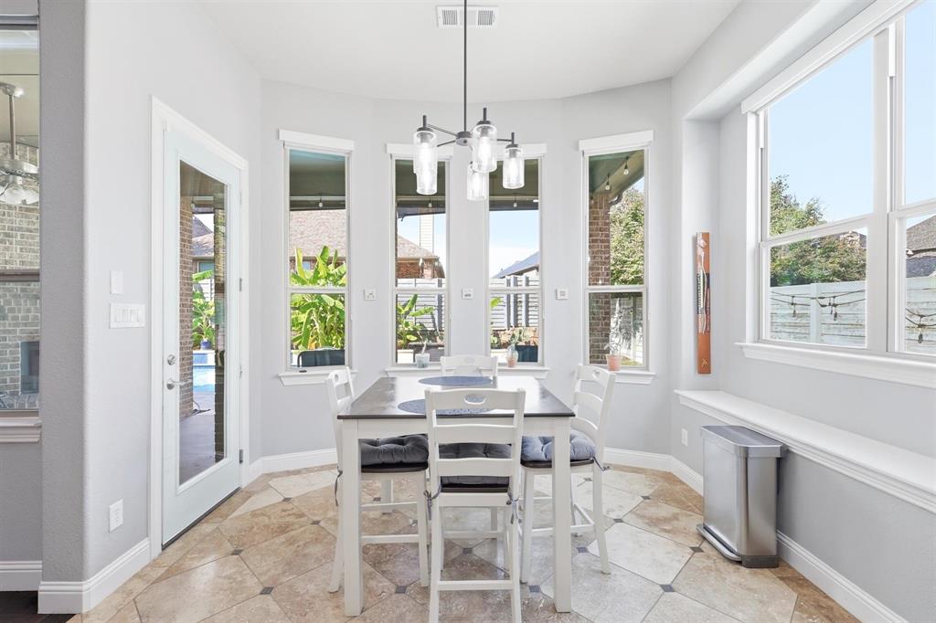 117 Birdcall Lane Argyle, TX 76226 - Photo 24 of 40 Sunroom / solarium with a chandelier