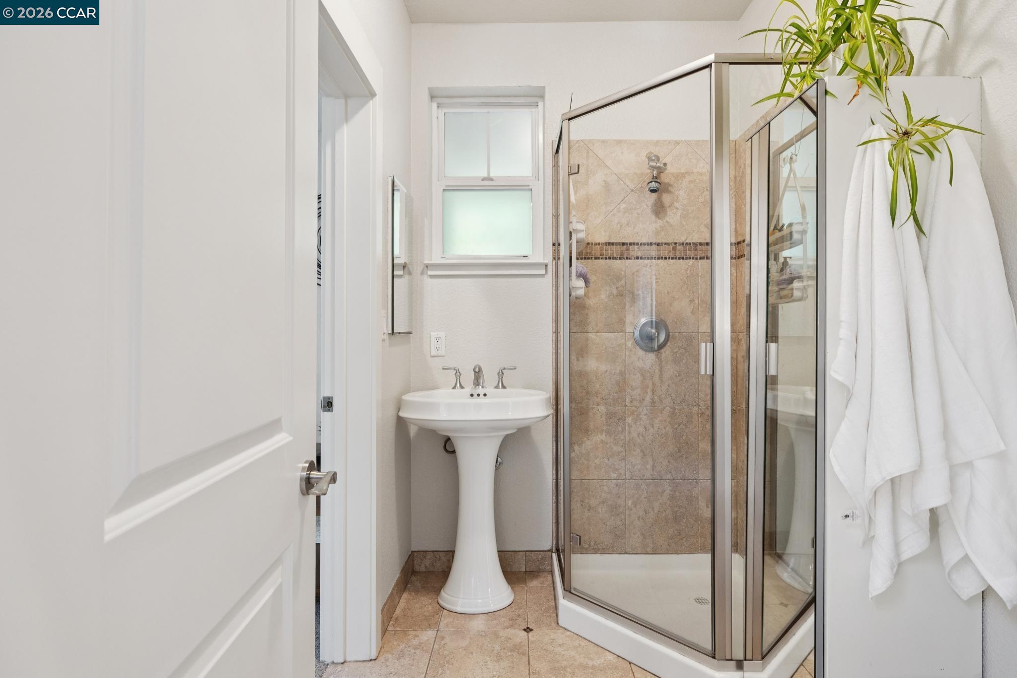 1980 Meadow Road Walnut Creek, CA 94595 - Photo 41 of 59 a bathroom with a shower