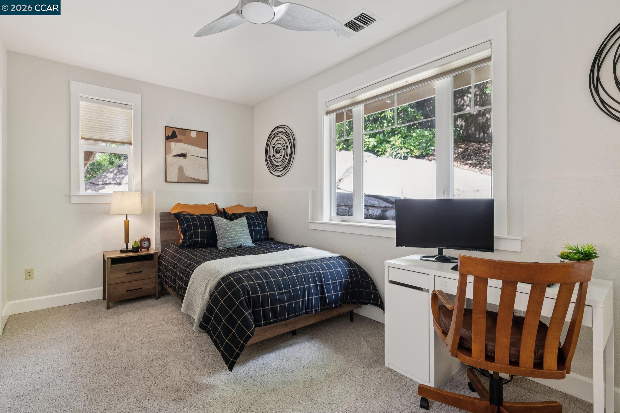 1980 Meadow Road Walnut Creek, CA 94595 - Photo 42 of 59 a bedroom with a bed and a window