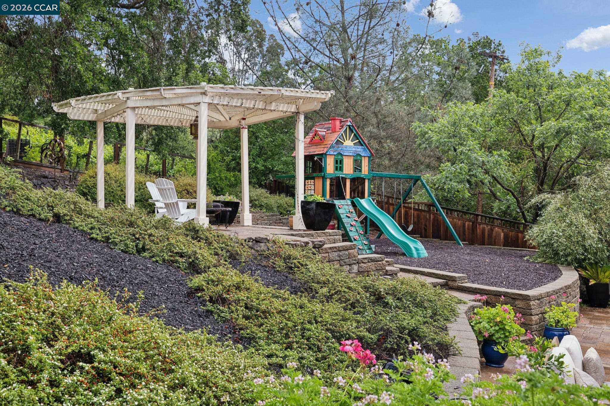 1980 Meadow Road Walnut Creek, CA 94595 - Photo 47 of 59 a view of a house with a yard and sitting area