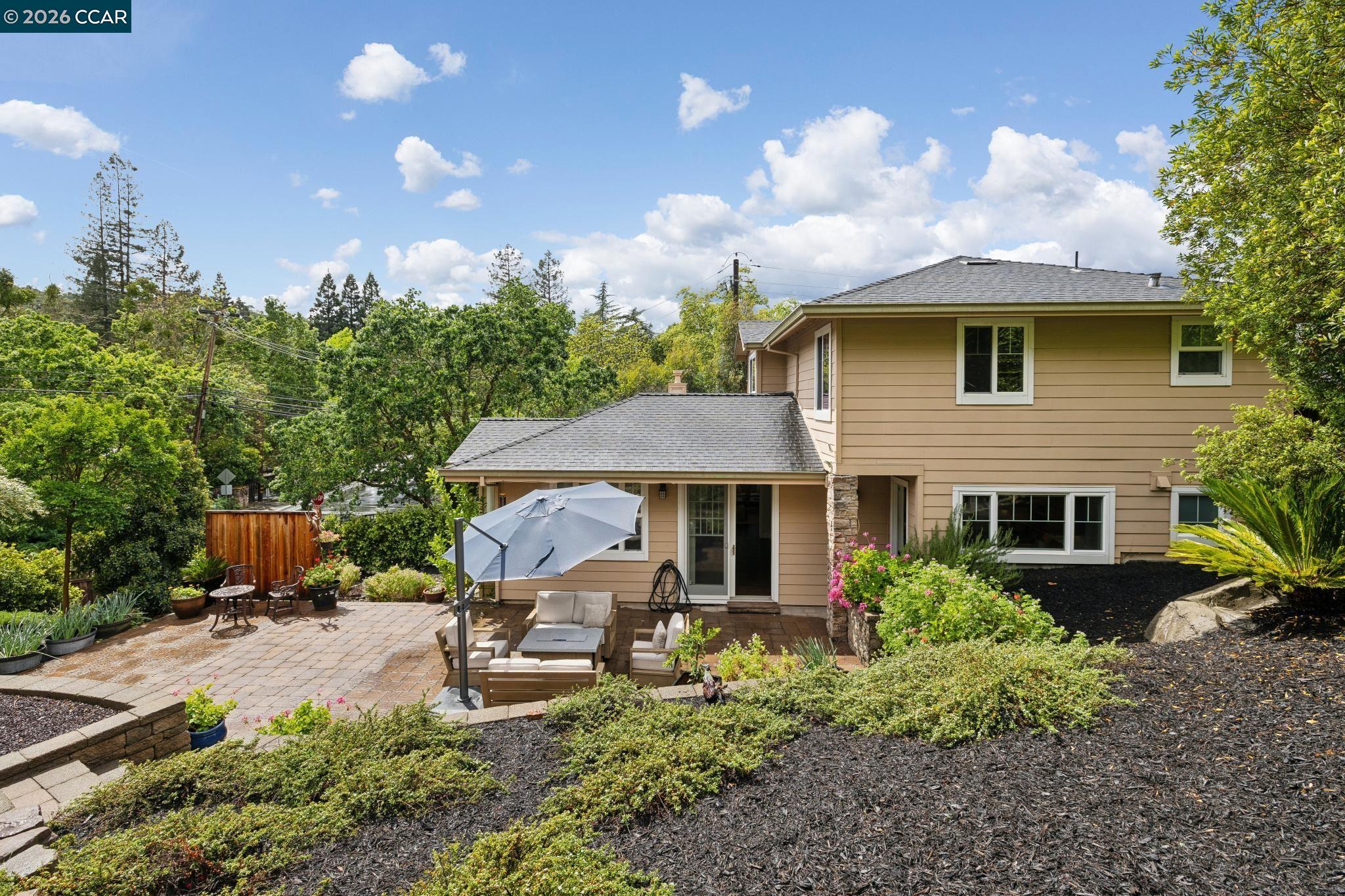 1980 Meadow Road Walnut Creek, CA 94595 - Photo 54 of 59 a front view of a house with garden