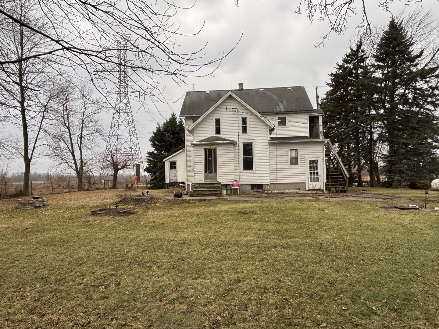 25241 South Will Center Road Monee, IL 60449 - Photo 3 of 17 a front view of a house with a yard
