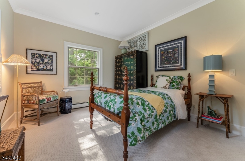 11 New Street Mendham, NJ 07945 - Photo 15 of 35 a bedroom with a bed and a lamp