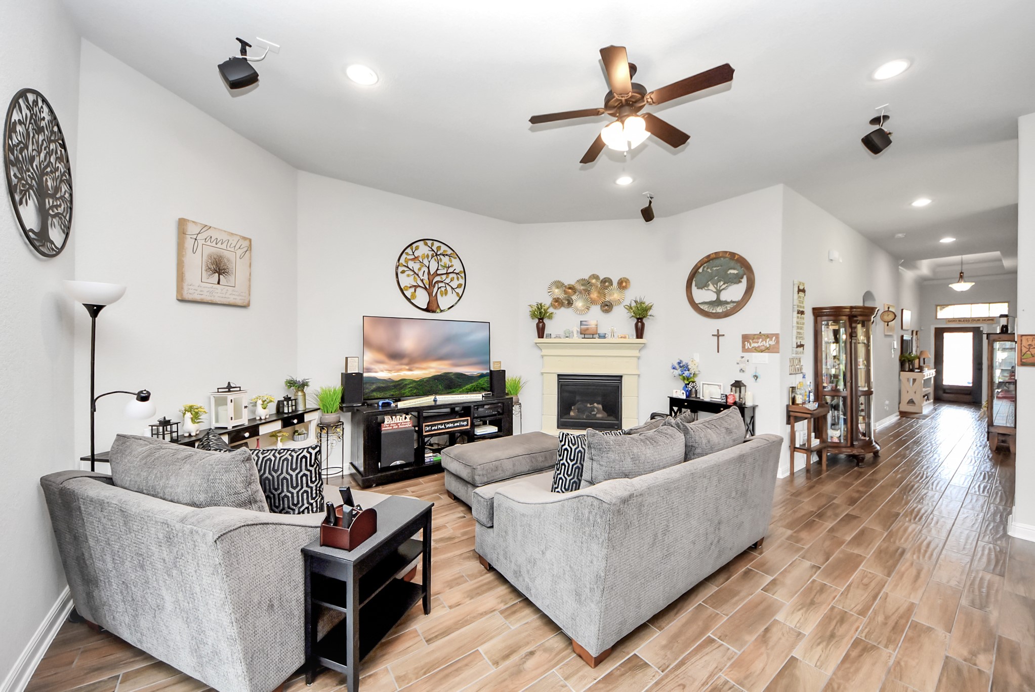 24503 Eucalyptus Way Spring, TX 77373 - Photo 23 of 27 a living room with fireplace furniture and a large window
