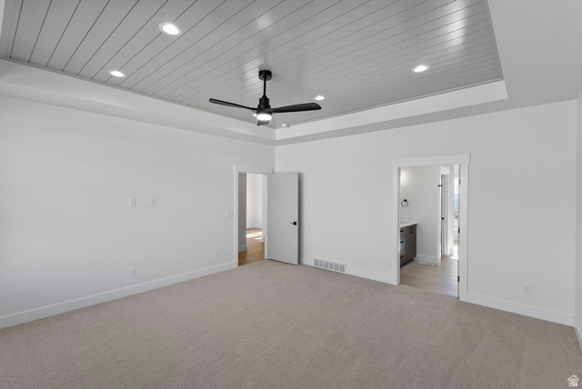 710 East Mountain Road North Ogden, UT 84414 - Photo 14 of 36 Unfurnished bedroom with wooden ceiling, light colored carpet, a ceiling fan, a raised ceiling, and recessed lighting