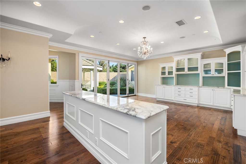 1450 North Nicky Way Orange, CA 92869 - Photo 19 of 64 a large white kitchen with a large window