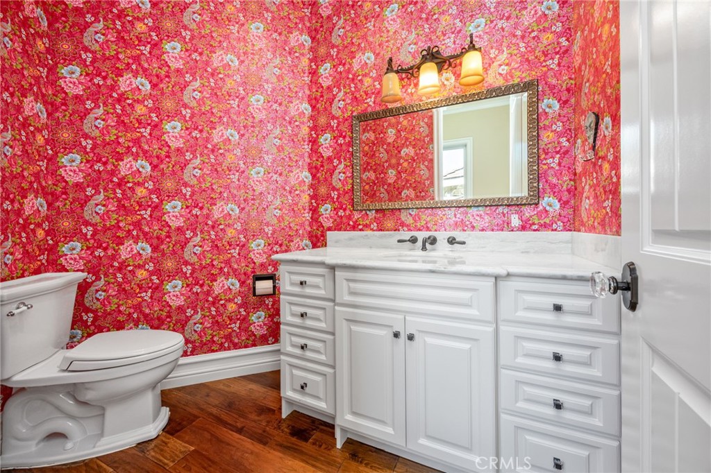 1450 North Nicky Way Orange, CA 92869 - Photo 22 of 64 a bathroom with a sink mirror vanity and toilet