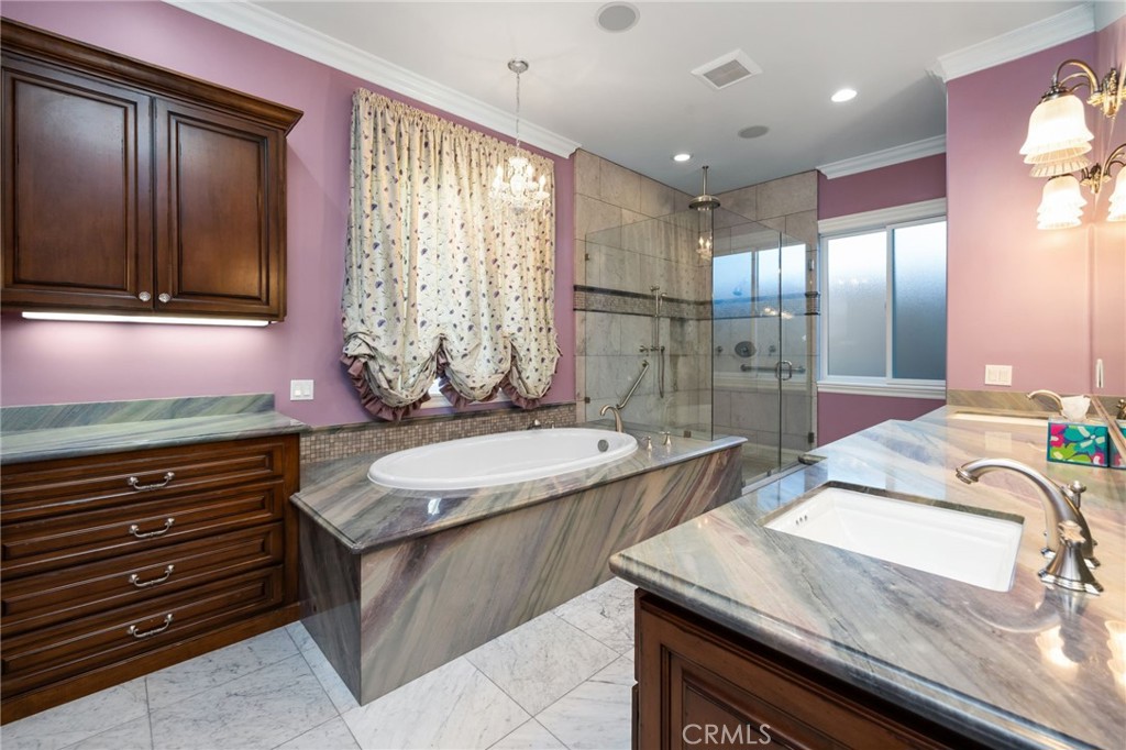 1450 North Nicky Way Orange, CA 92869 - Photo 29 of 64 a bathroom with a granite countertop sink and a mirror