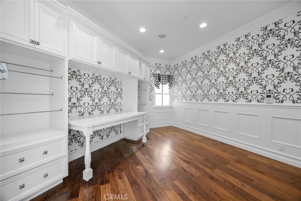 1450 North Nicky Way Orange, CA 92869 - Photo 32 of 64 a view of an empty room with wooden floor