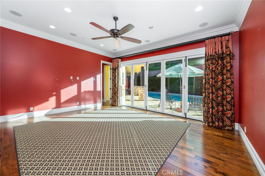 1450 North Nicky Way Orange, CA 92869 - Photo 35 of 64 a view of a hall with wooden floor and a large window