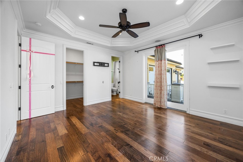 1450 North Nicky Way Orange, CA 92869 - Photo 38 of 64 a view of empty room with wooden floor and ceiling fan