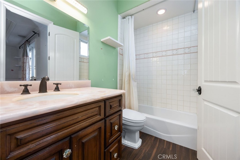 1450 North Nicky Way Orange, CA 92869 - Photo 39 of 64 a bathroom with a granite countertop bathtub shower sink vanity and toilet
