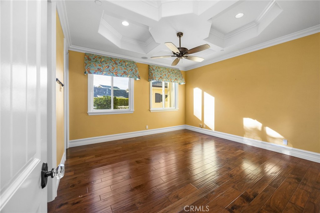 1450 North Nicky Way Orange, CA 92869 - Photo 43 of 64 a view of an empty room with a window and wooden floor